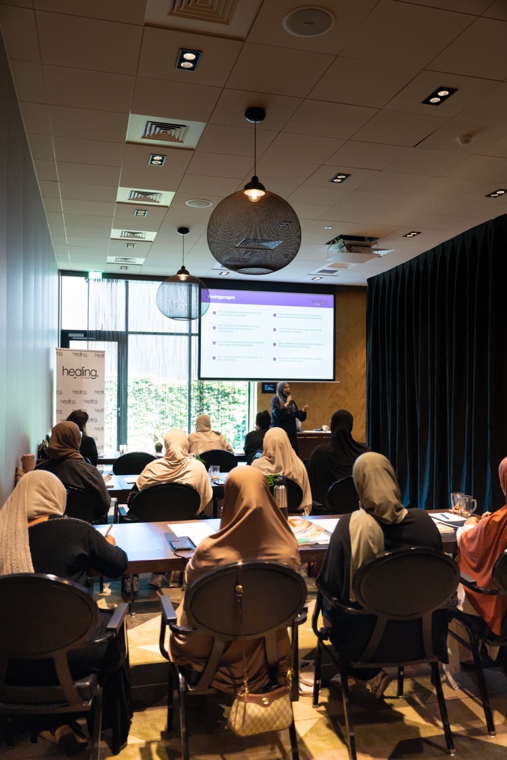 Presentatie tijdens een Hijama Academy-opleidingsdag